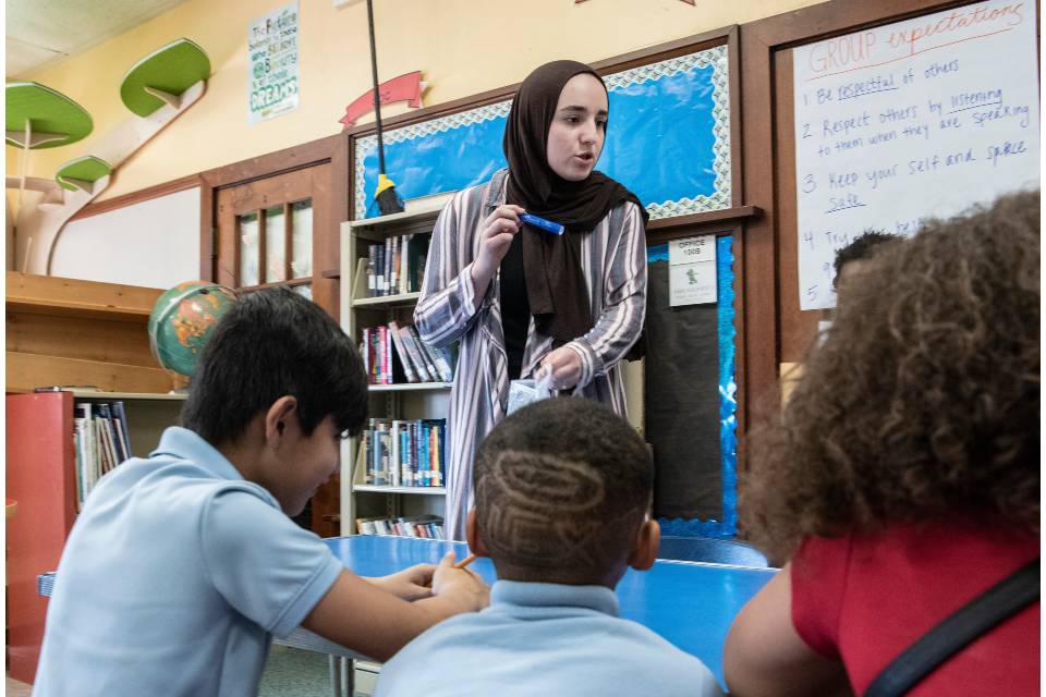 Mason student teacher and three students Mason student teacher and three students