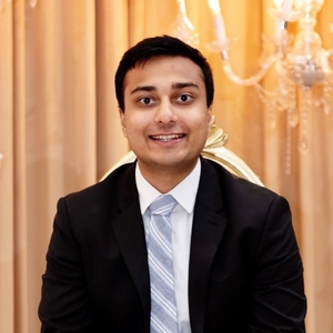 Akash Shah smiling in a professional headshot.