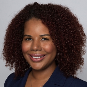 Ashlee Roberts, Ph.D. smiling in a professional headshot.