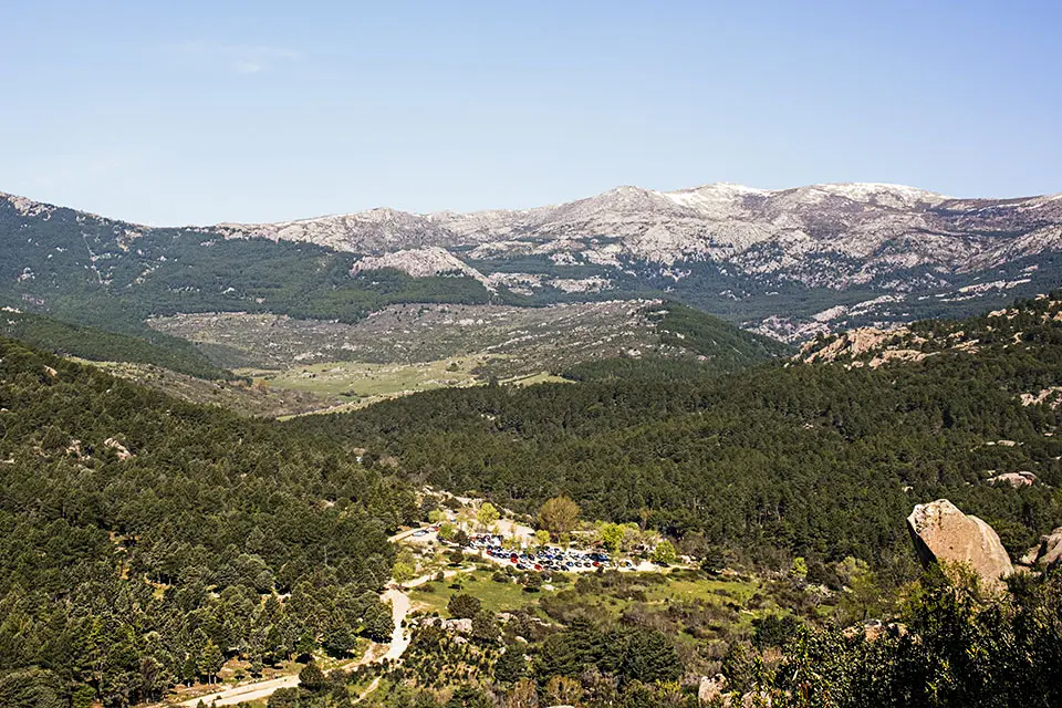 Sierra de Guadarrama A landscape with trees and mountains