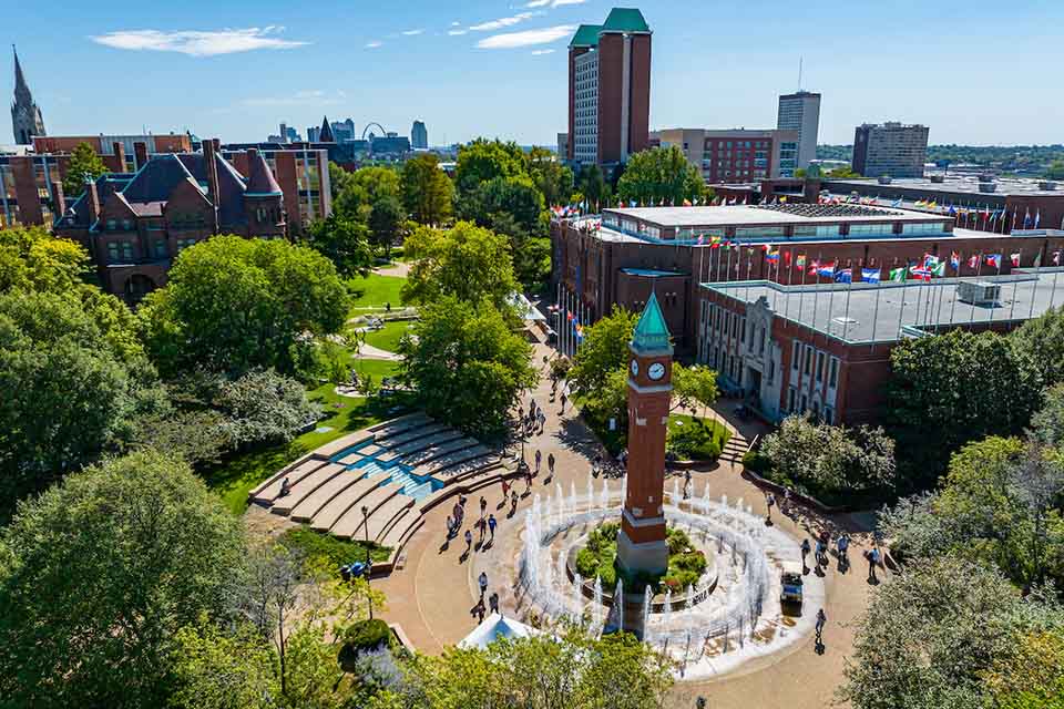 West Pine Mall An aerial view of Saint Louis University's campus with the clock tower at the center and students walking around West Pine Mall