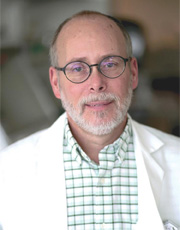 Headshot of John Tavis Headshot of John Tavis