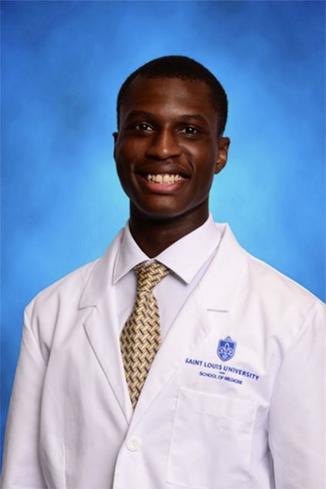Abdul-Haq Alli Abdul-Haq Alli poses for a photo in a white coat against a blue background.