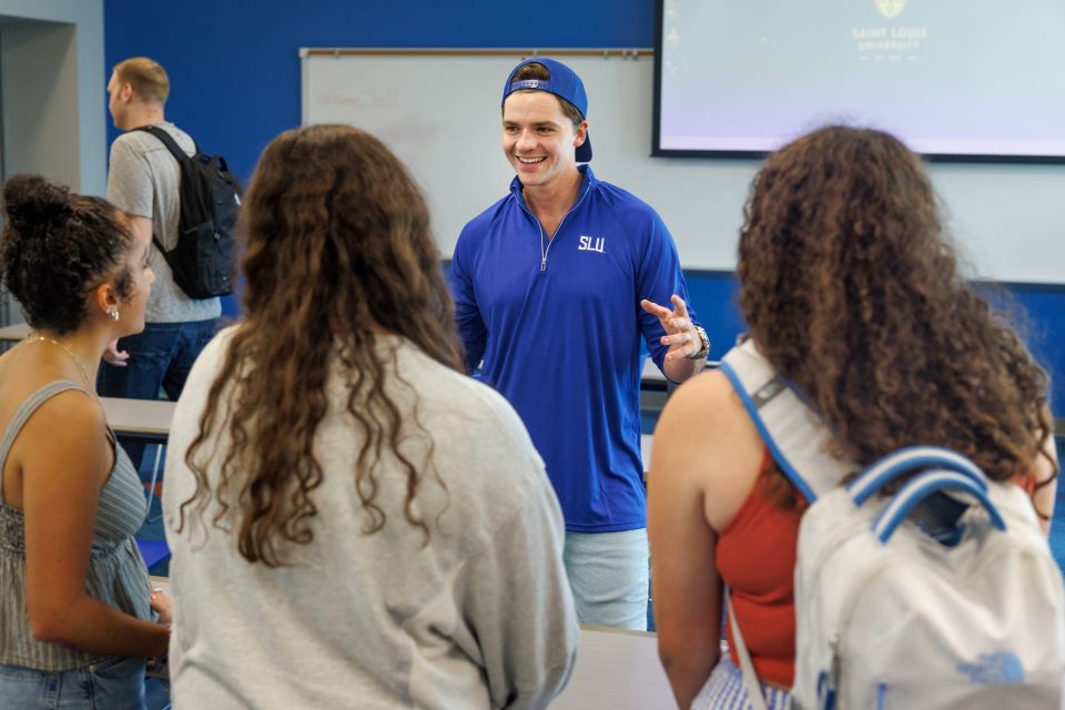 Joel Courtney in class with students Joel Courtney in class with students