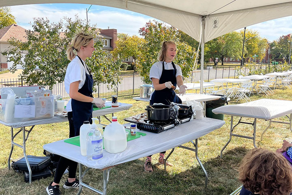 Team members cooking at an event on SLU’s campus. Team members cooking at an event on SLU’s campus.