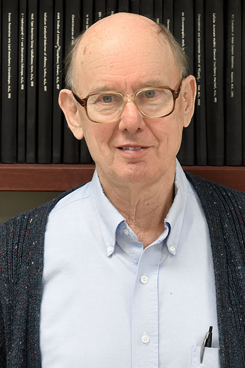 a man poses for a photo